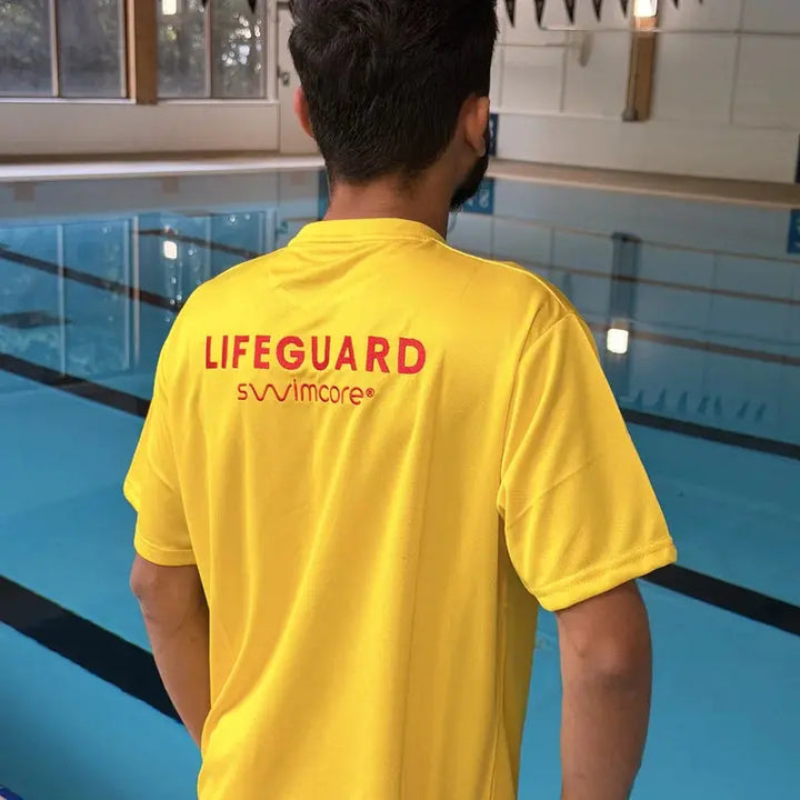 Yellow lifeguard t-shirt back and side view at the pool